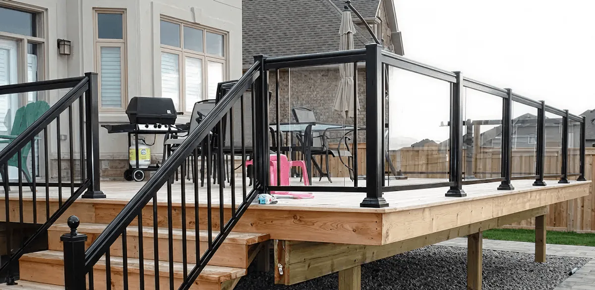 Handrail installation on a deck staircase for safety and code compliance in Oakland, CA