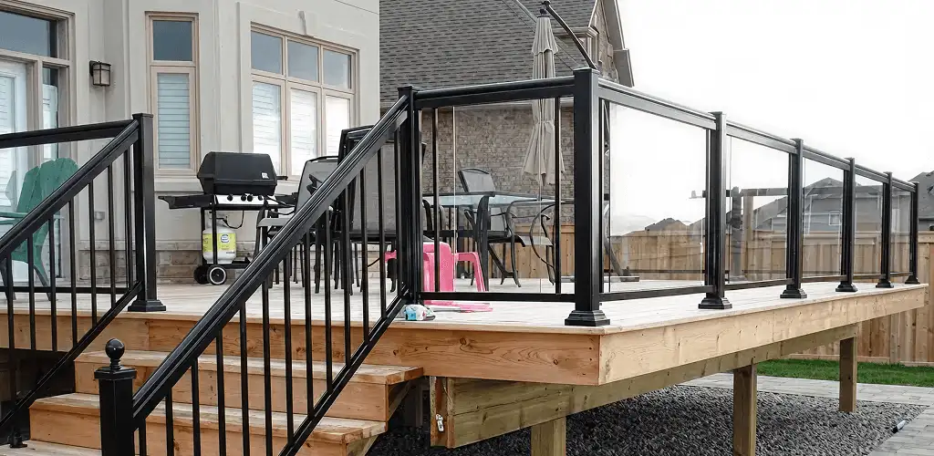 Handrail installation on a deck staircase for safety and code compliance in Oakland, CA